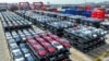 FILE - This photo taken Sept. 11, 2023, shows BYD electric cars waiting to be loaded on a ship stacked at the international container terminal of Taicang Port at Suzhou Port, in China's eastern Jiangsu Province. 